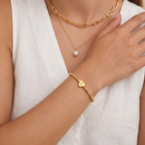 Beaded bracelet with an engraved initial