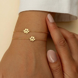 Personalized name bracelet with paw print motif