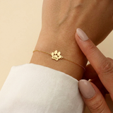 Personalized name bracelet with paw print motif