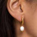 Pearl hoop earrings with a hammered texture