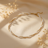 Gold necklace with an infinity knot