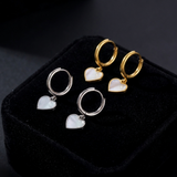 Hoop earrings with a heart pendant made of mother-of-pearl – elegant women's jewelry