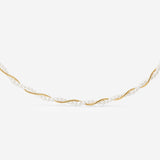 Gold necklace with an infinity knot