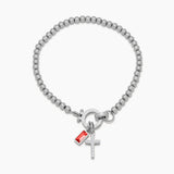 Beaded bracelet with a birthstone and a cross pendant