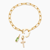 Paperclip bracelet with a birthstone and a cross charm