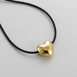 Cord necklace with a bubble heart-shaped pendant