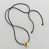 Cord necklace with a bubble heart-shaped pendant