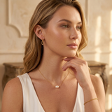 Gold choker with a freshwater pearl