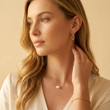 Gold choker with a freshwater pearl