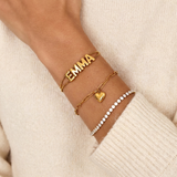 Gold paperclip bracelet with a heart-shaped pendant