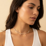 Gold necklace with an infinity knot