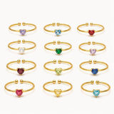 Ring with a heart and a birthstone