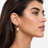 Pearl hoop earrings with a hammered texture