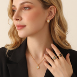 Gold vintage necklace with a green stone